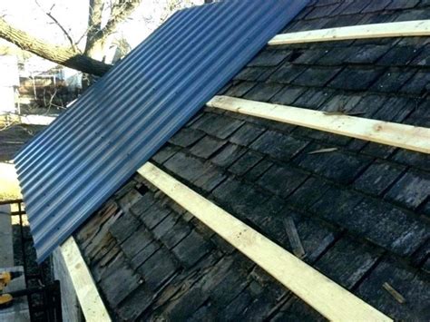 installing sheet metal roofing over shingles|shingle to metal roof transition.